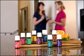 One lady sharing Young Living Essential Oils with another lady.